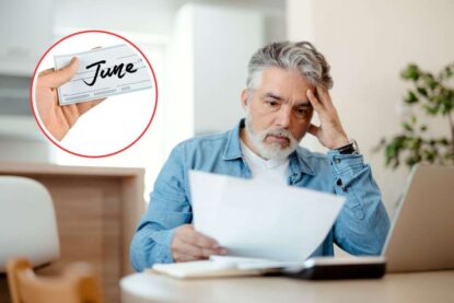 uomo disperato che guarda fogli e cerchio con scritta june